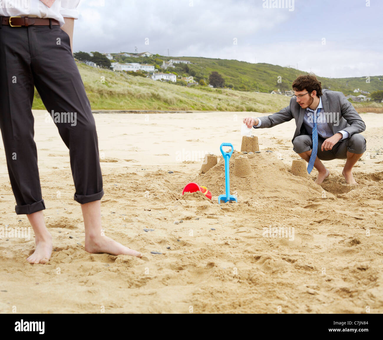 Château de sable de construction d'affaires Banque D'Images