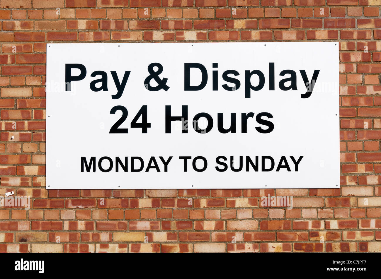 Inscrivez-vous pour un 24 heures, du lundi au dimanche, de payer et d'affichage parking. Banque D'Images