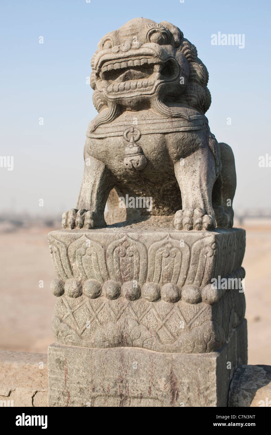 Les lions en pierre sur Lugou Qiao (Marco Polo Bridge) Banque D'Images