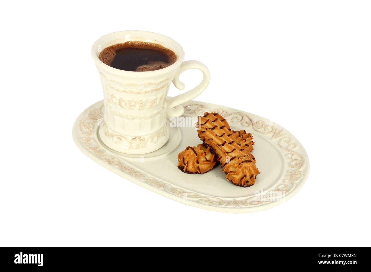 Tasse de café avec des gâteaux isolated on white Banque D'Images