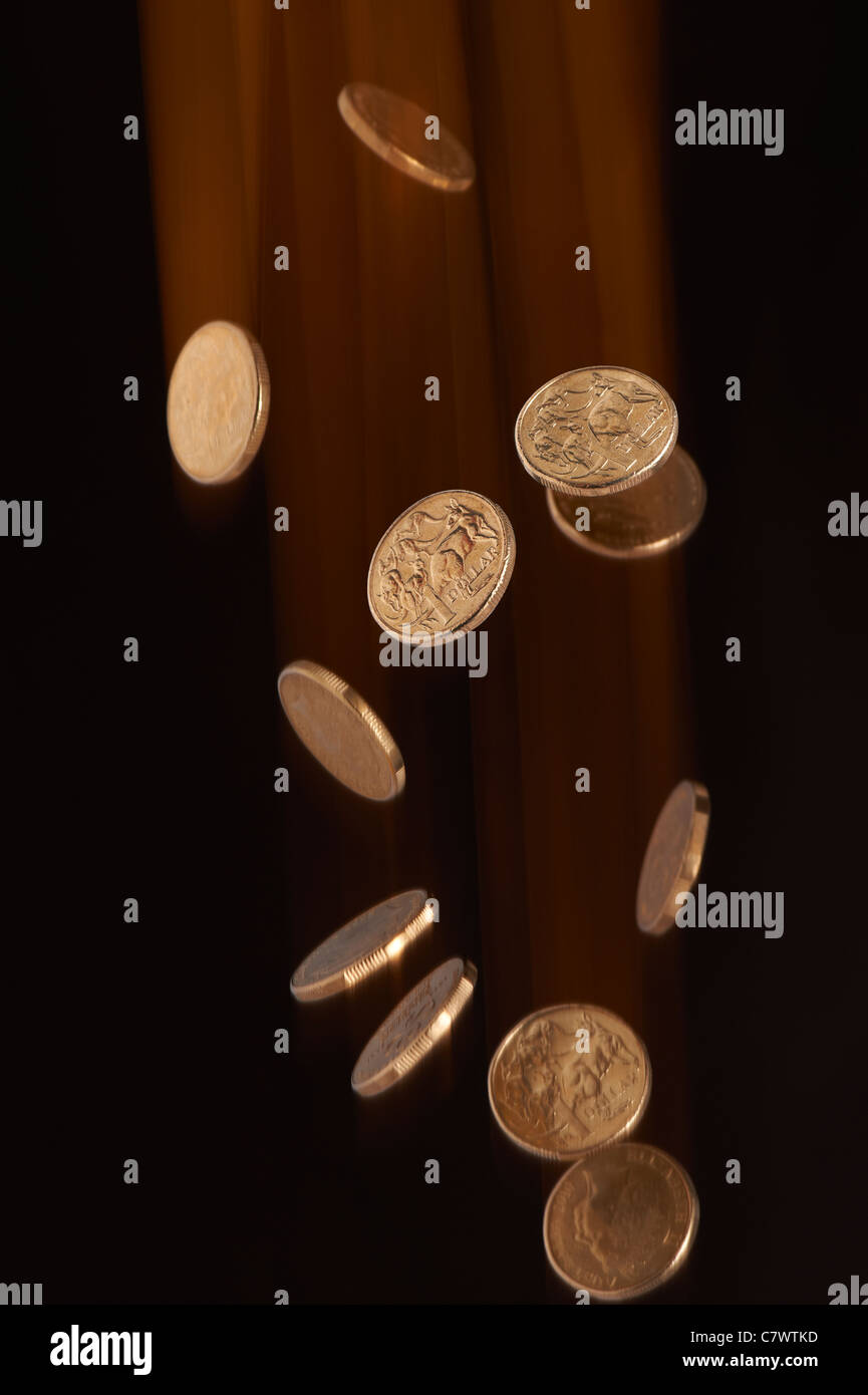 Australian dollar coins falling Banque D'Images