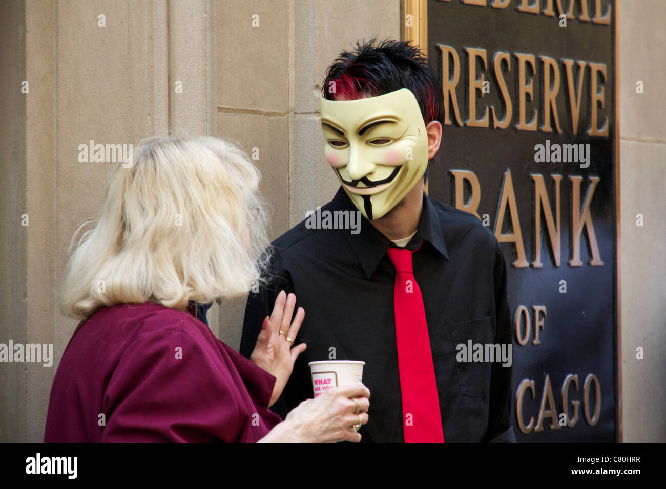 Homme portant un masque de Guy Fawkes. Chicago occupent de protester contre la Banque fédérale de réserve. Banque D'Images
