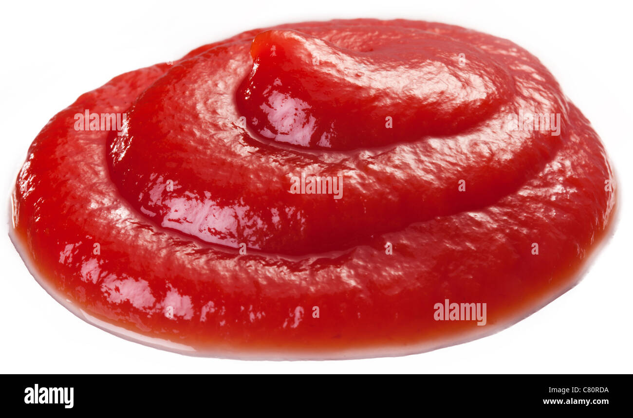 Partie de ketchup isolé sur un fond blanc. Banque D'Images