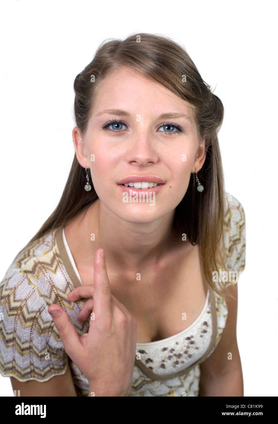 Close up of girl gesturing à regarder ou écouter. Banque D'Images