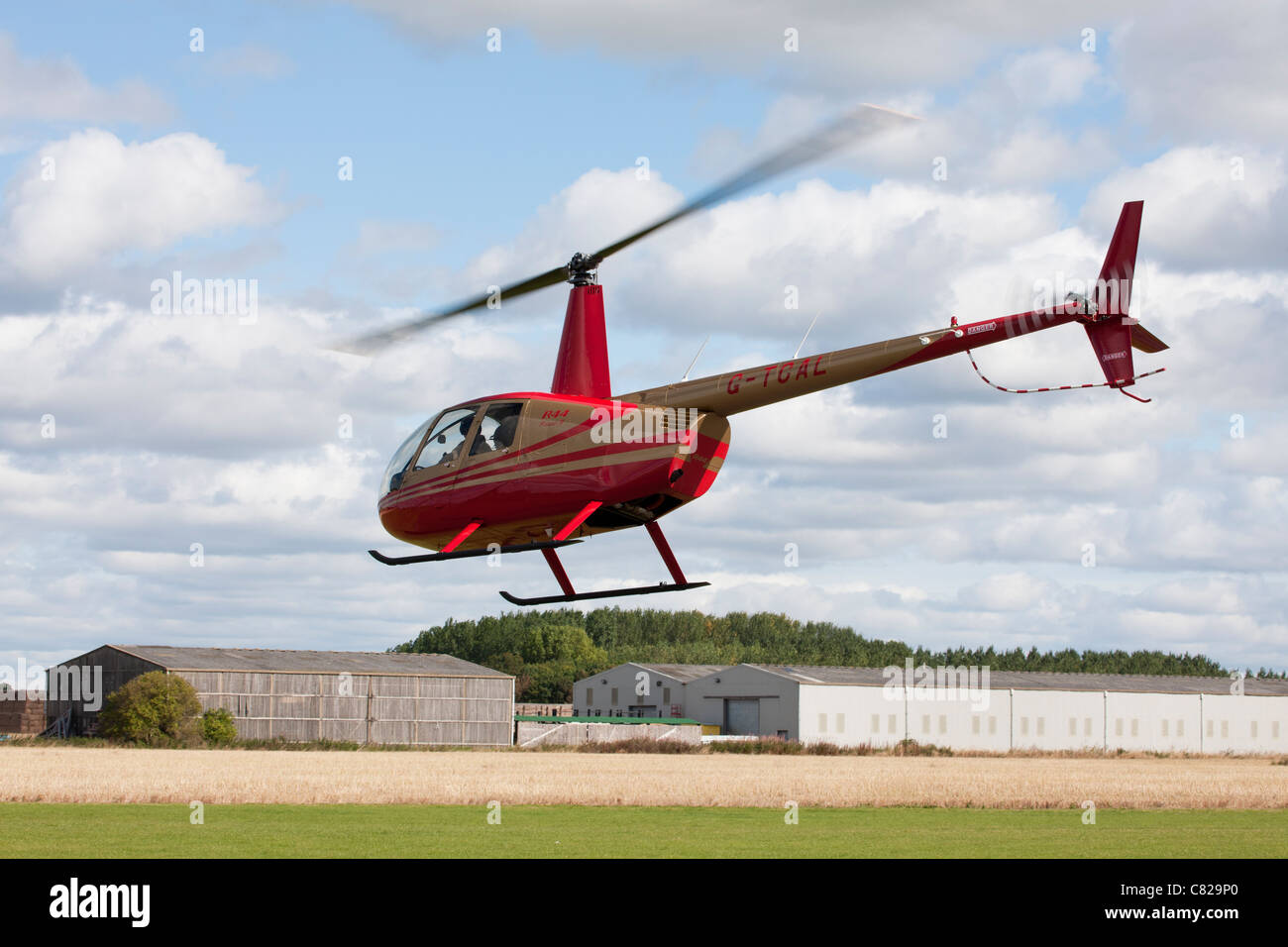Robinson R44 Raven II G-TCAL Banque D'Images