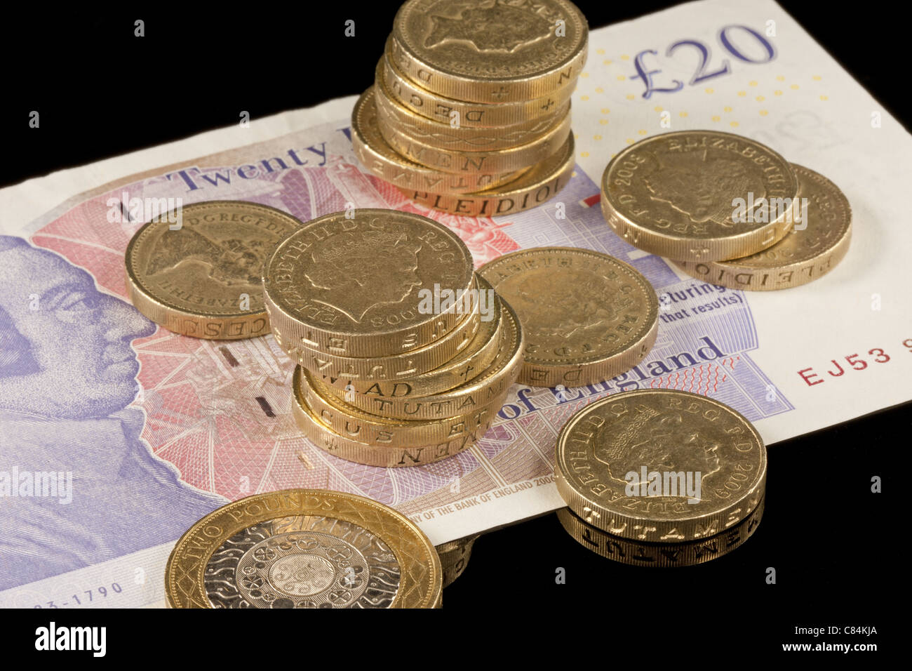 Livre britannique de pièces sur un billet de 20 € Banque D'Images