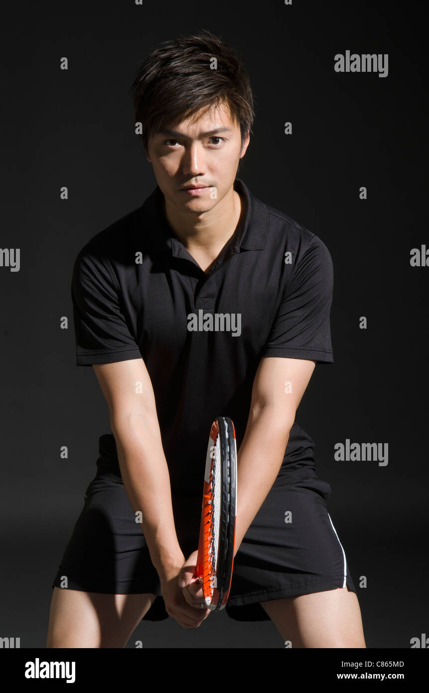 Un jeune joueur de tennis Banque D'Images