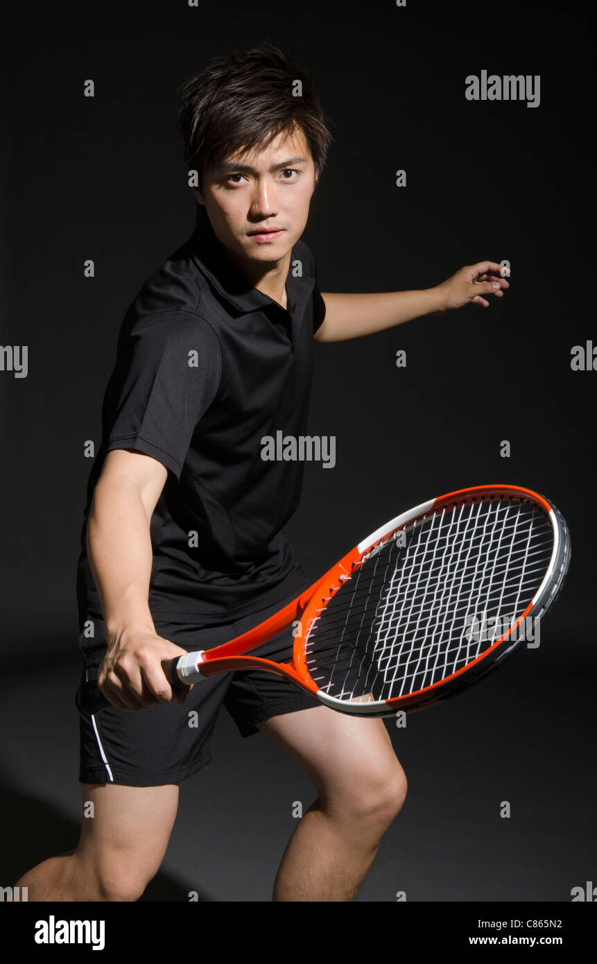 Un jeune joueur de tennis Banque D'Images