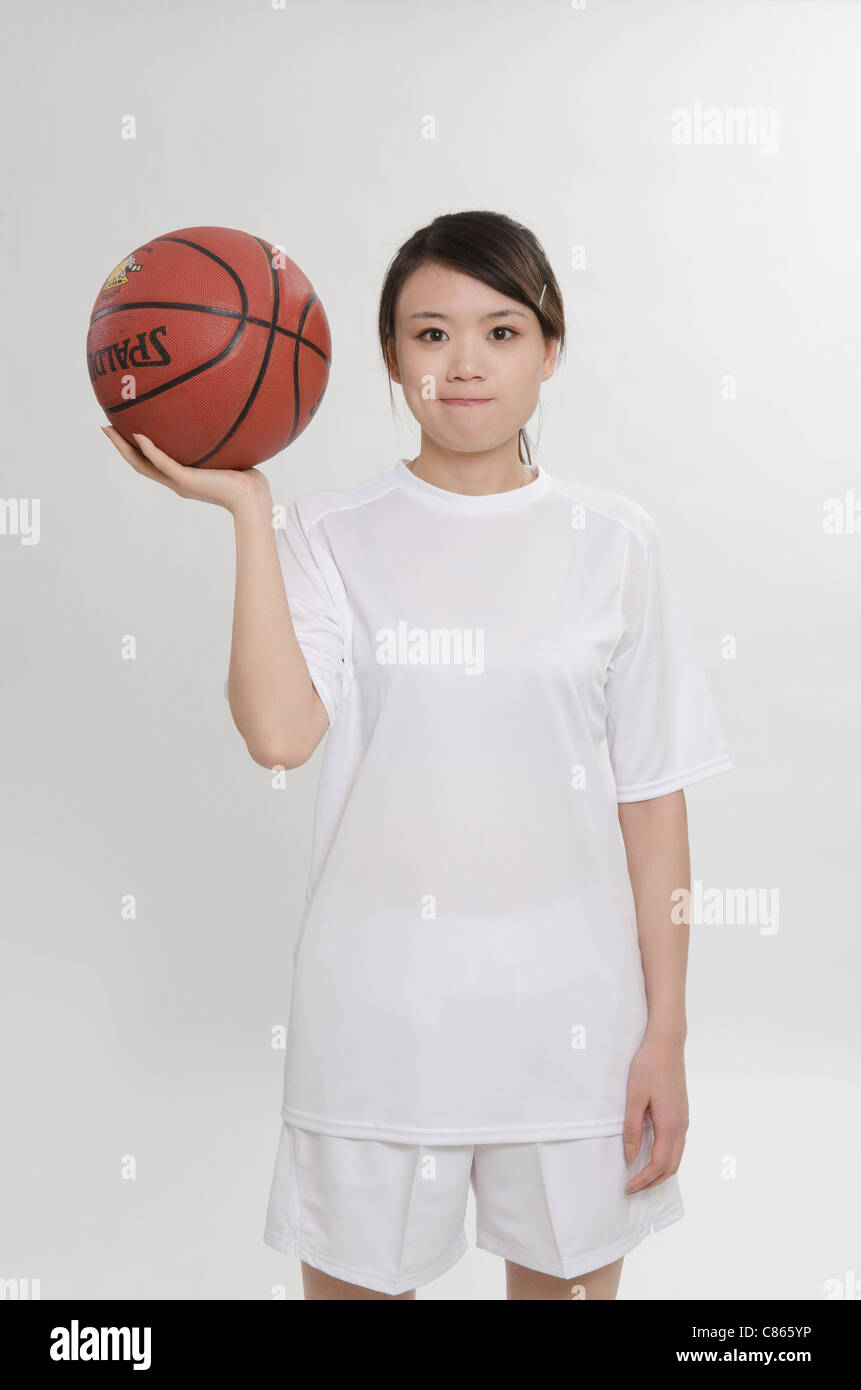Un joueur de basket-ball féminin Banque D'Images