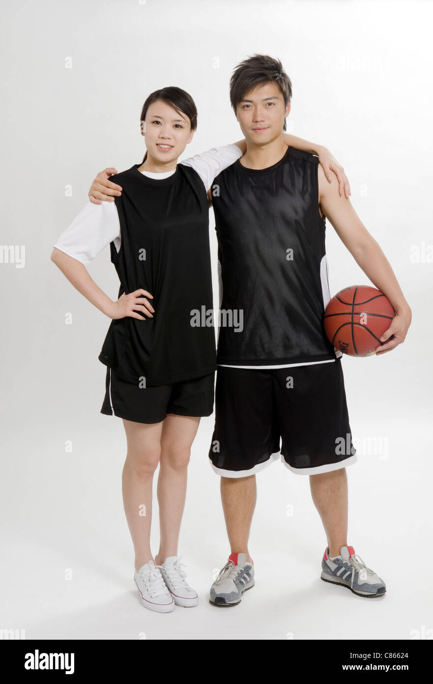 Un couple de basket-ball Banque D'Images
