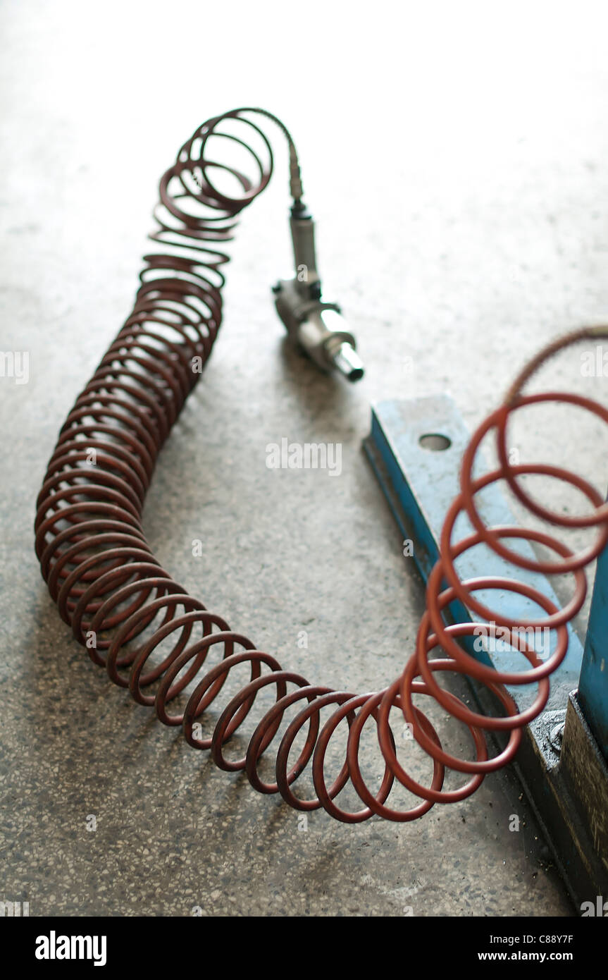 Wrenche avec flexible de l'air pneumatique Banque D'Images