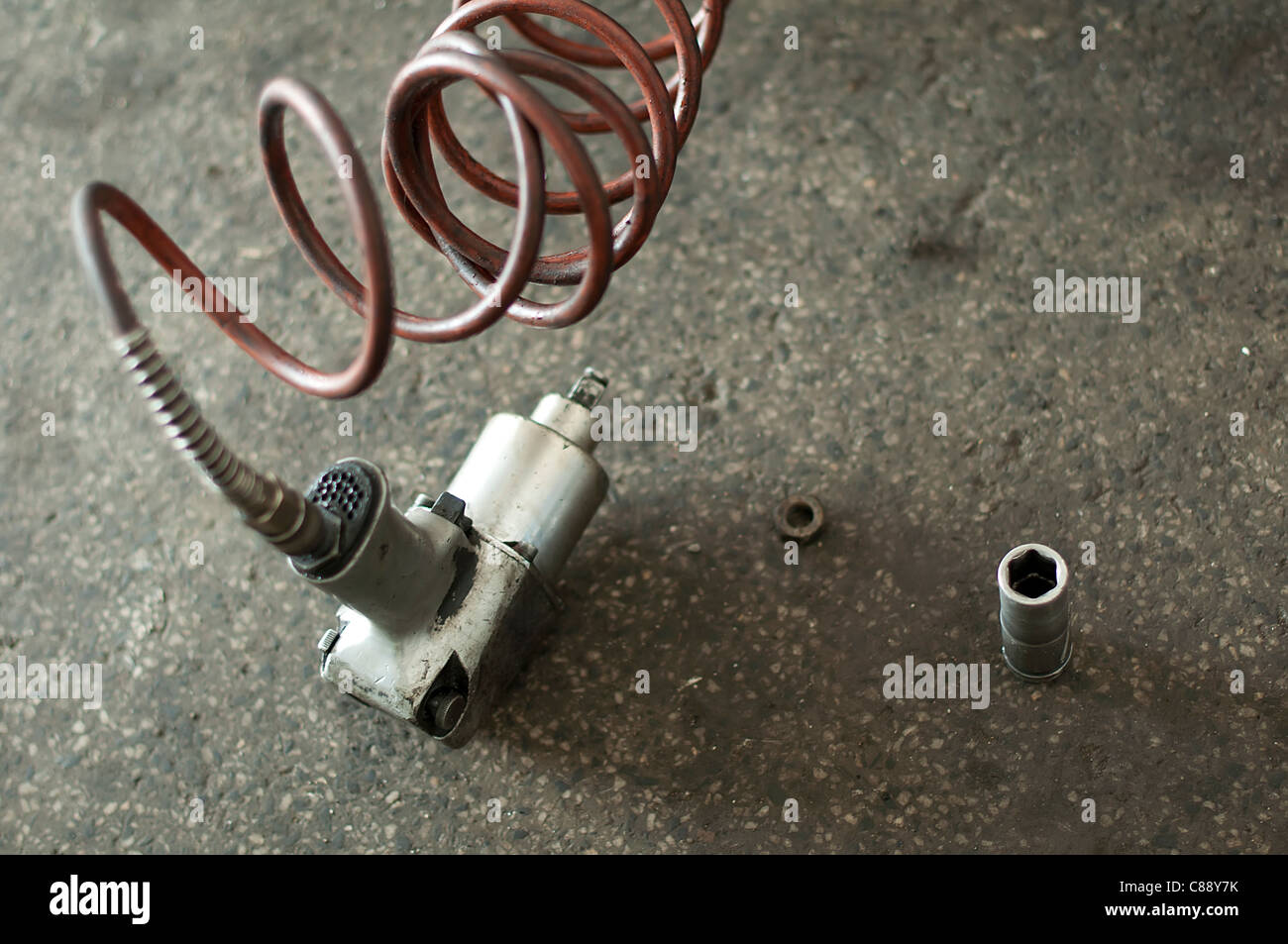 Wrenche avec flexible de l'air pneumatique Banque D'Images