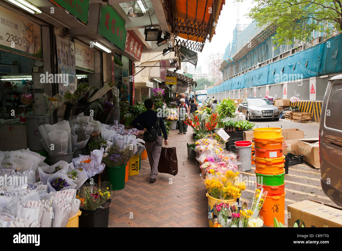 Fleurs à vendre sur le trottoir dans le marché aux fleurs de Hong-Kong Chine Asie Banque D'Images