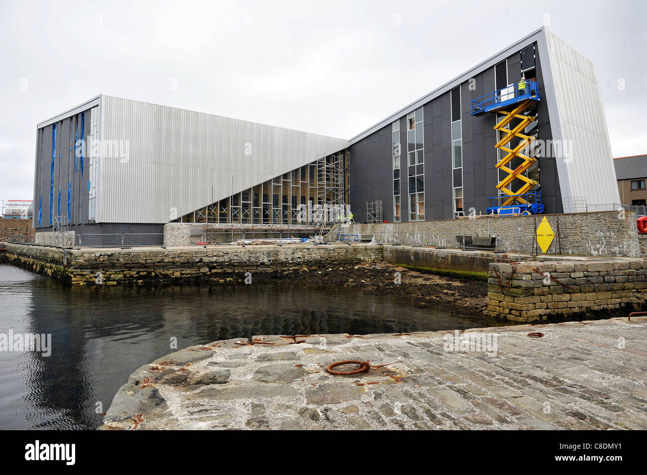 Avis de "areel'. Mareel est un lieu de musique, cinéma et d'enseignement actuellement en construction sur le front de mer de Lerwick. Banque D'Images