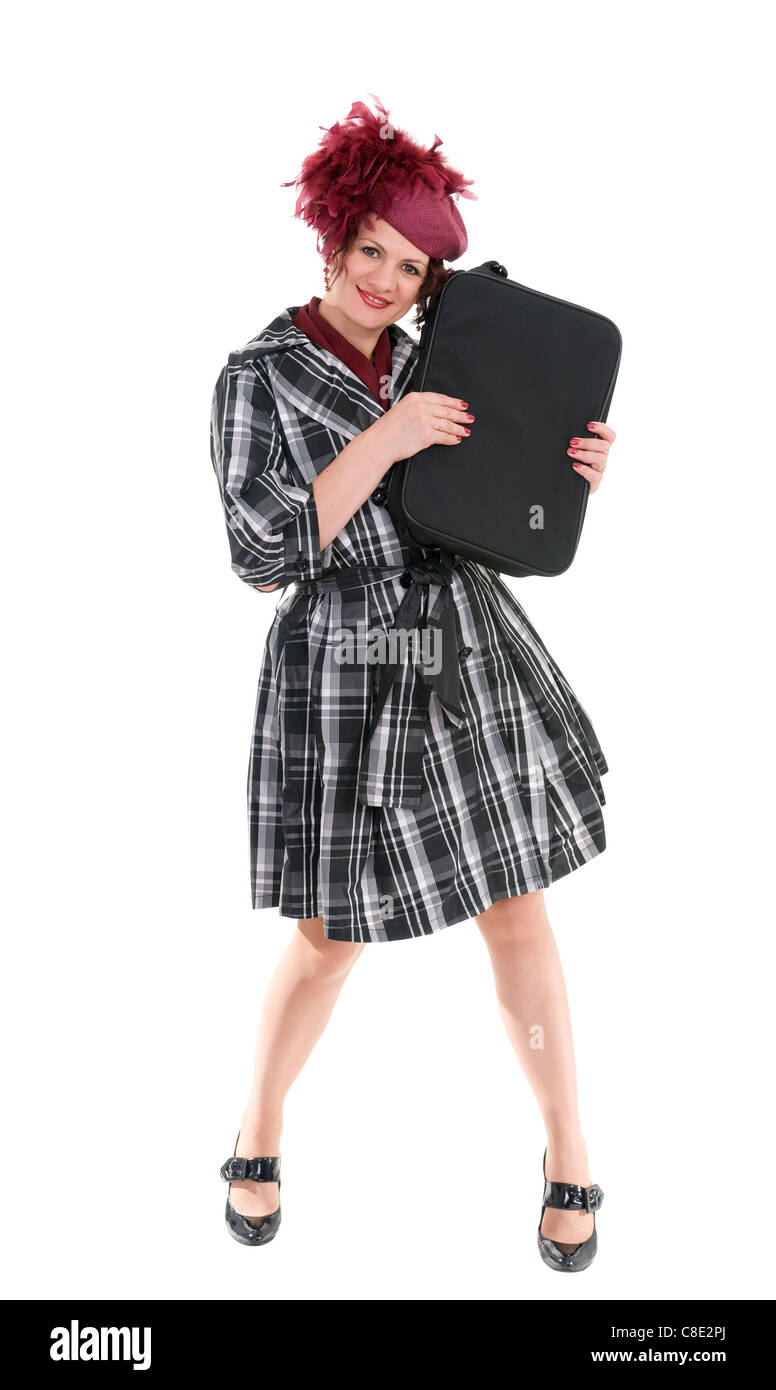 La femme avec un sac dans un ladies' hat isolé sur fond blanc Banque D'Images