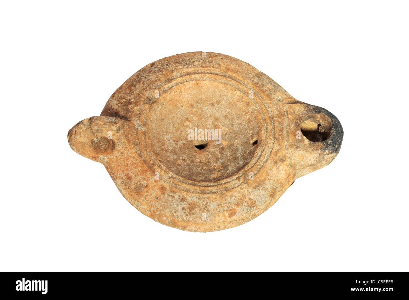 Lampe à huile romaine poterie de Carthage isolé sur fond blanc Banque D'Images