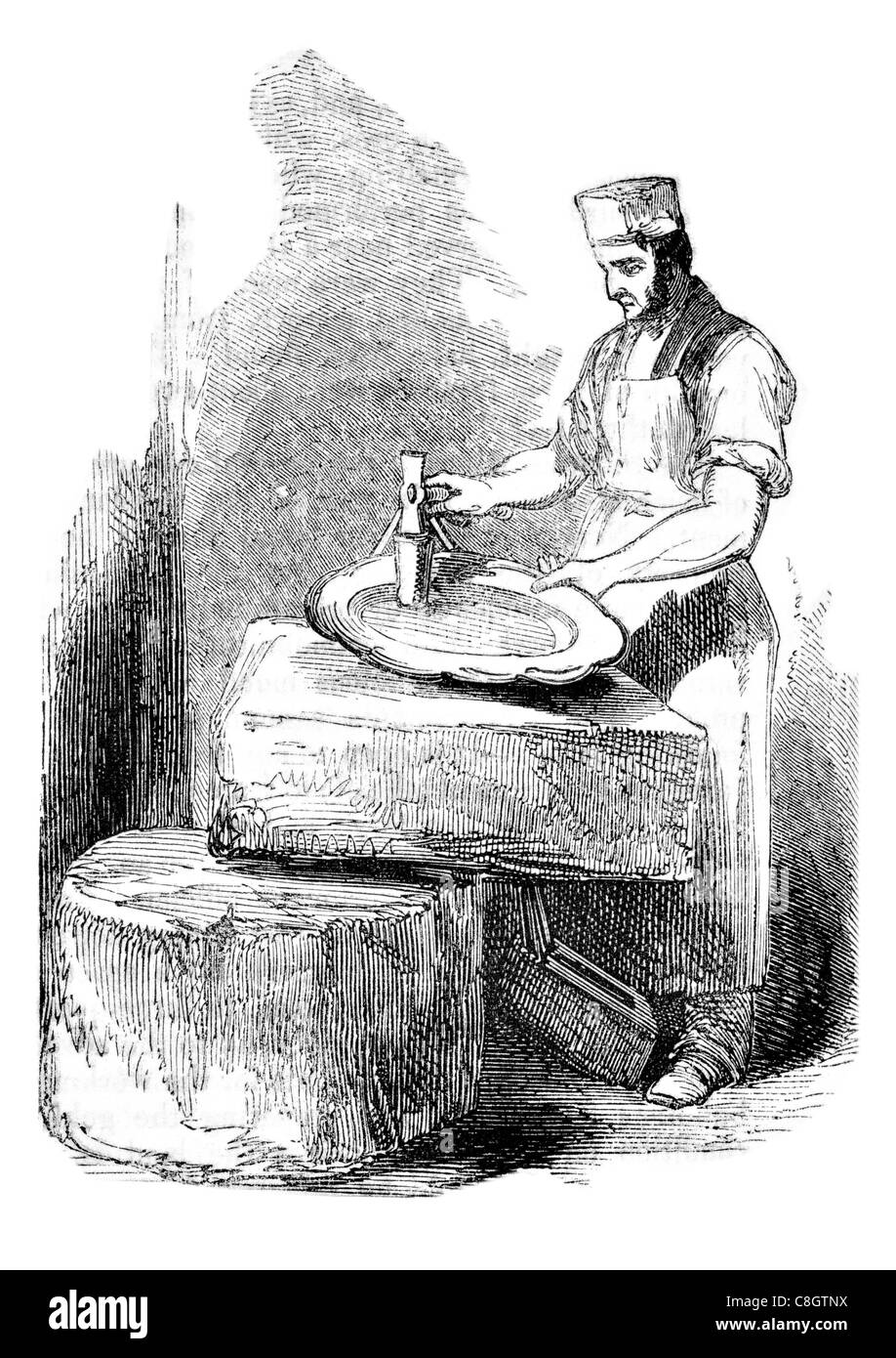 Le matriçage façonnage silver coups de marteau artisan orfèvre fait main Banque D'Images