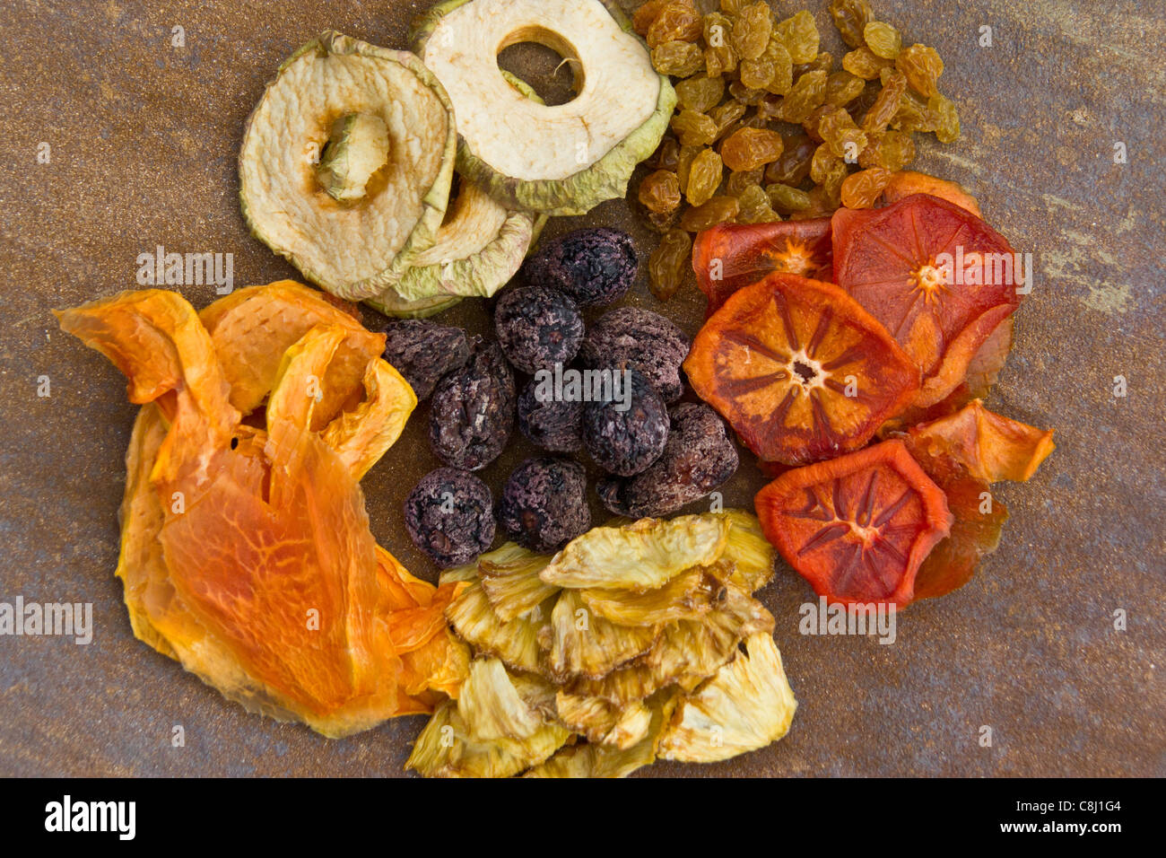 Figues noires, fruits secs, fruits comestibles, Ebenaceae, Fuyu, pommes Granny, vie saine, japonais, le kaki kaki, le foo Banque D'Images