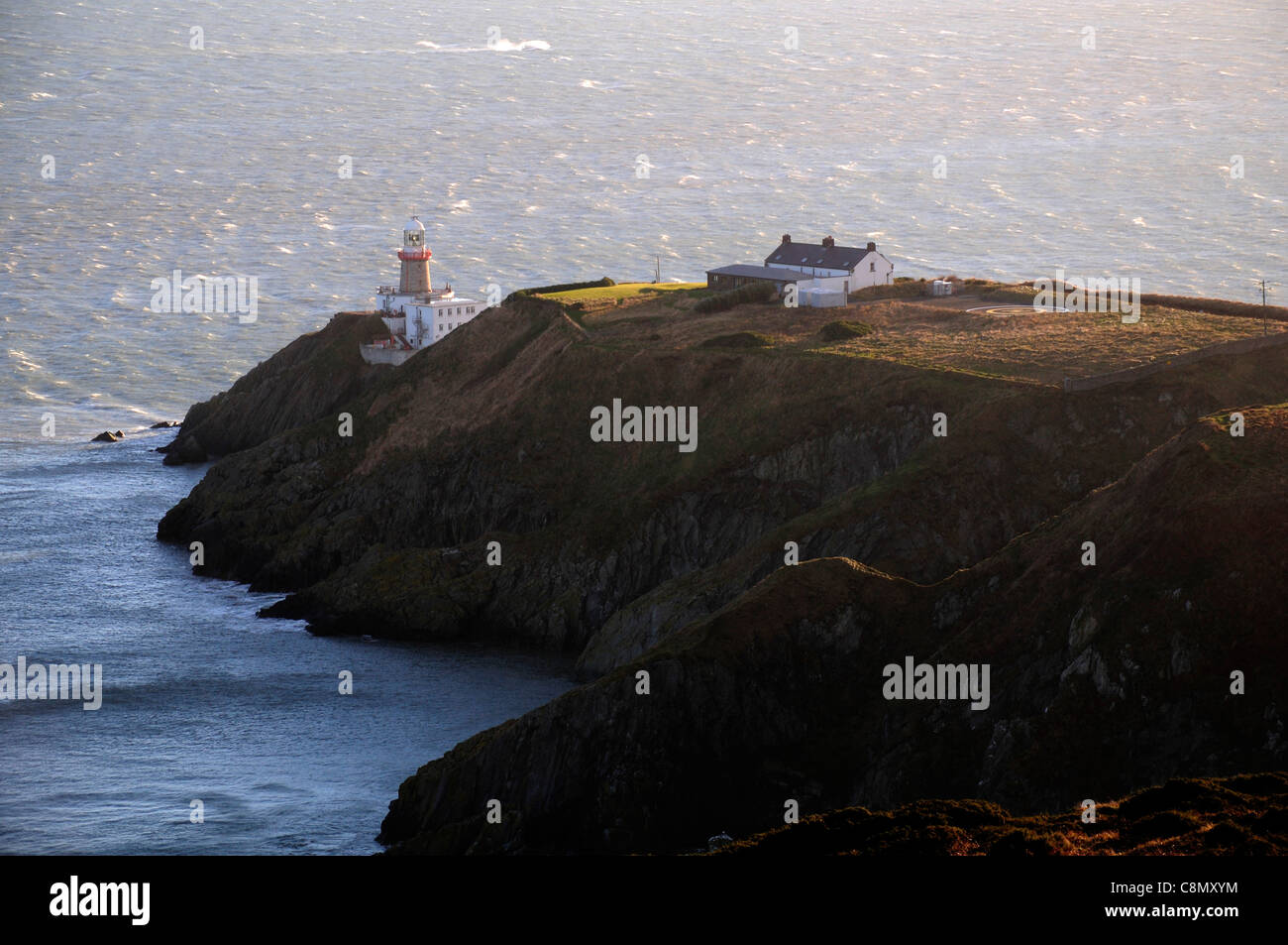 L'irlandaise Bailey Phare sur howth head co Dublin surplombant la baie de Dublin Banque D'Images