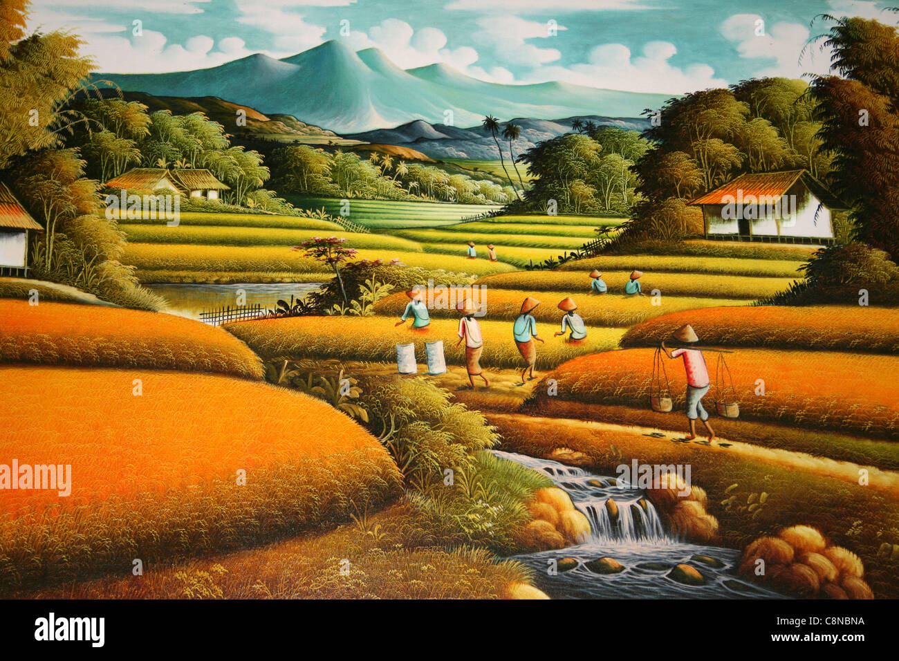 La peinture traditionnelle indonésienne de rizières sur fond d'un volcan Banque D'Images