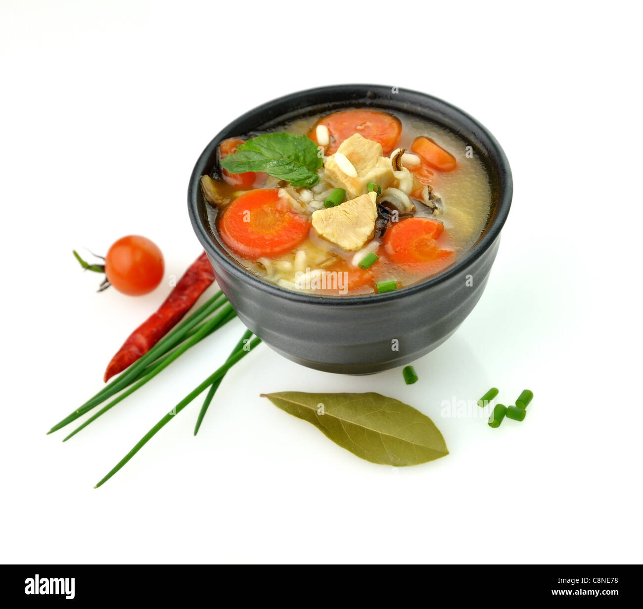 Soupe Poulet et riz sauvage aux légumes Banque D'Images