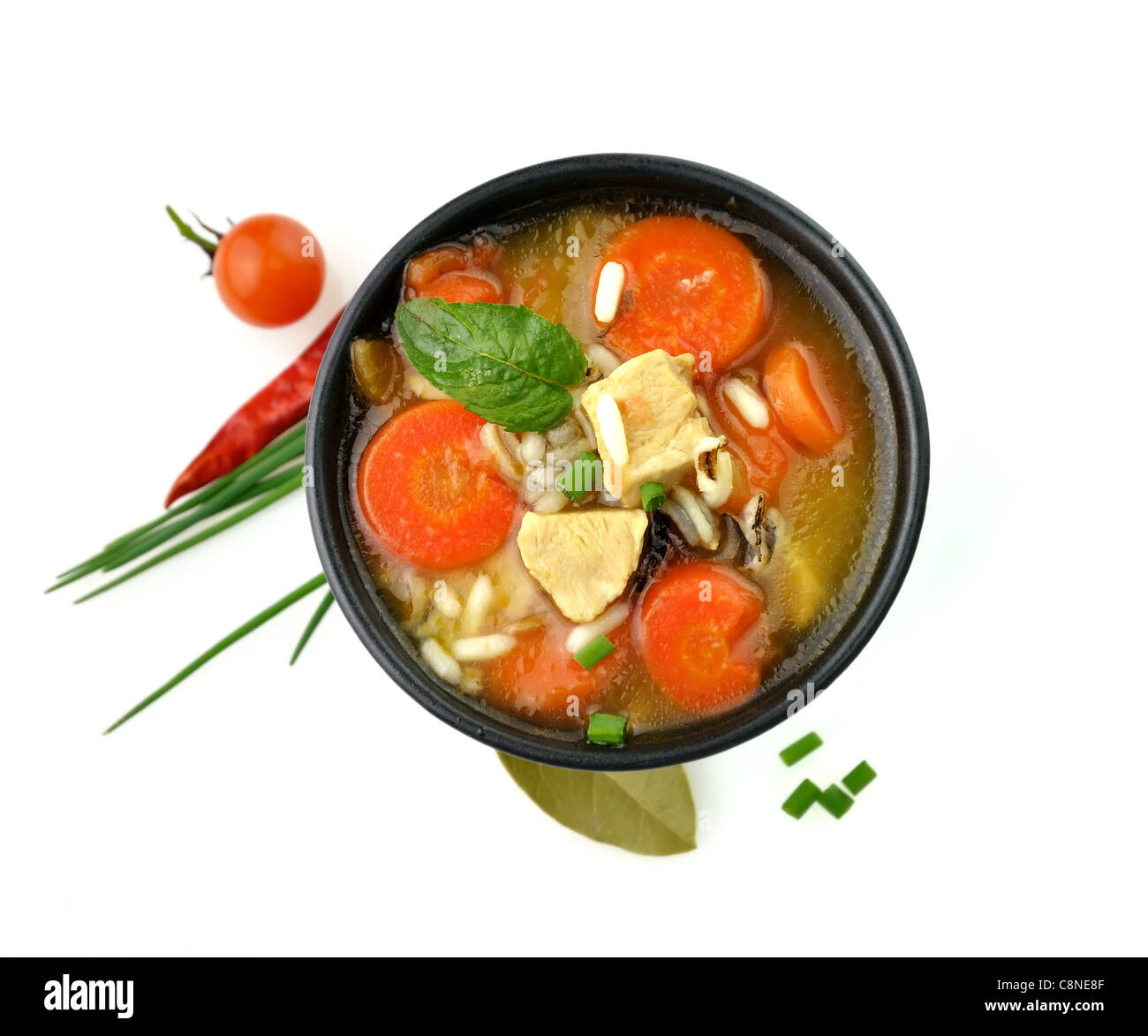 Soupe Poulet et riz sauvage aux légumes Banque D'Images