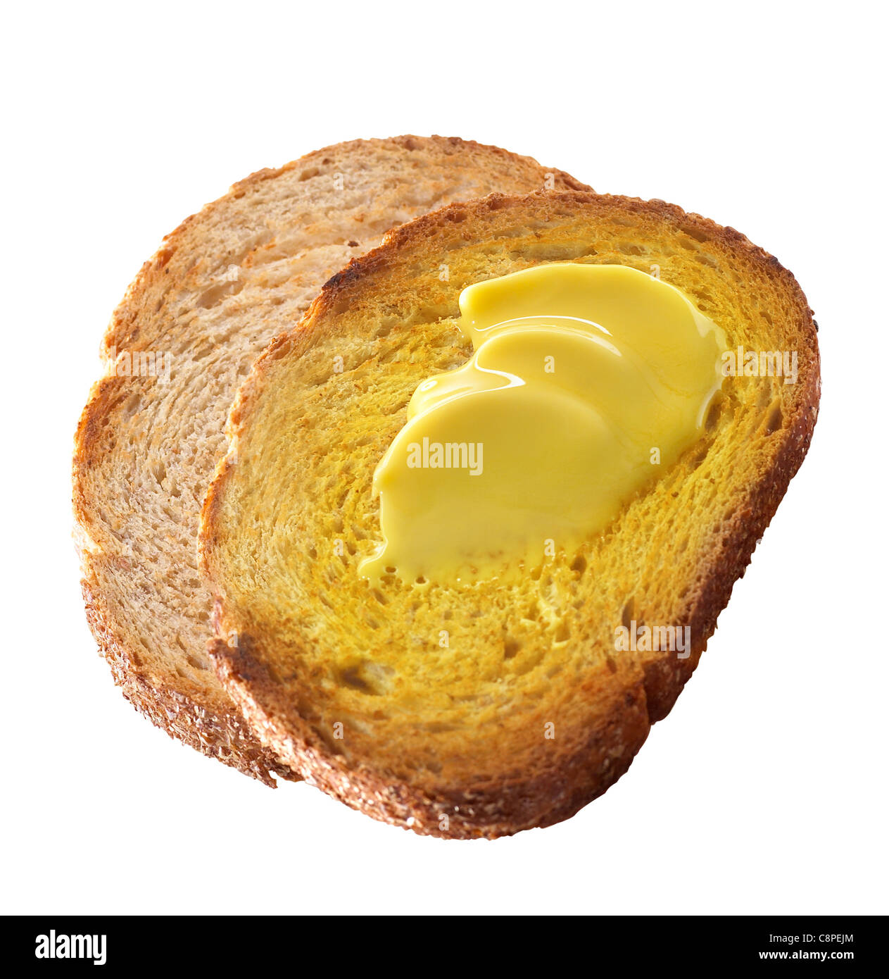Beurre fondu sur les tranches de pain Banque D'Images