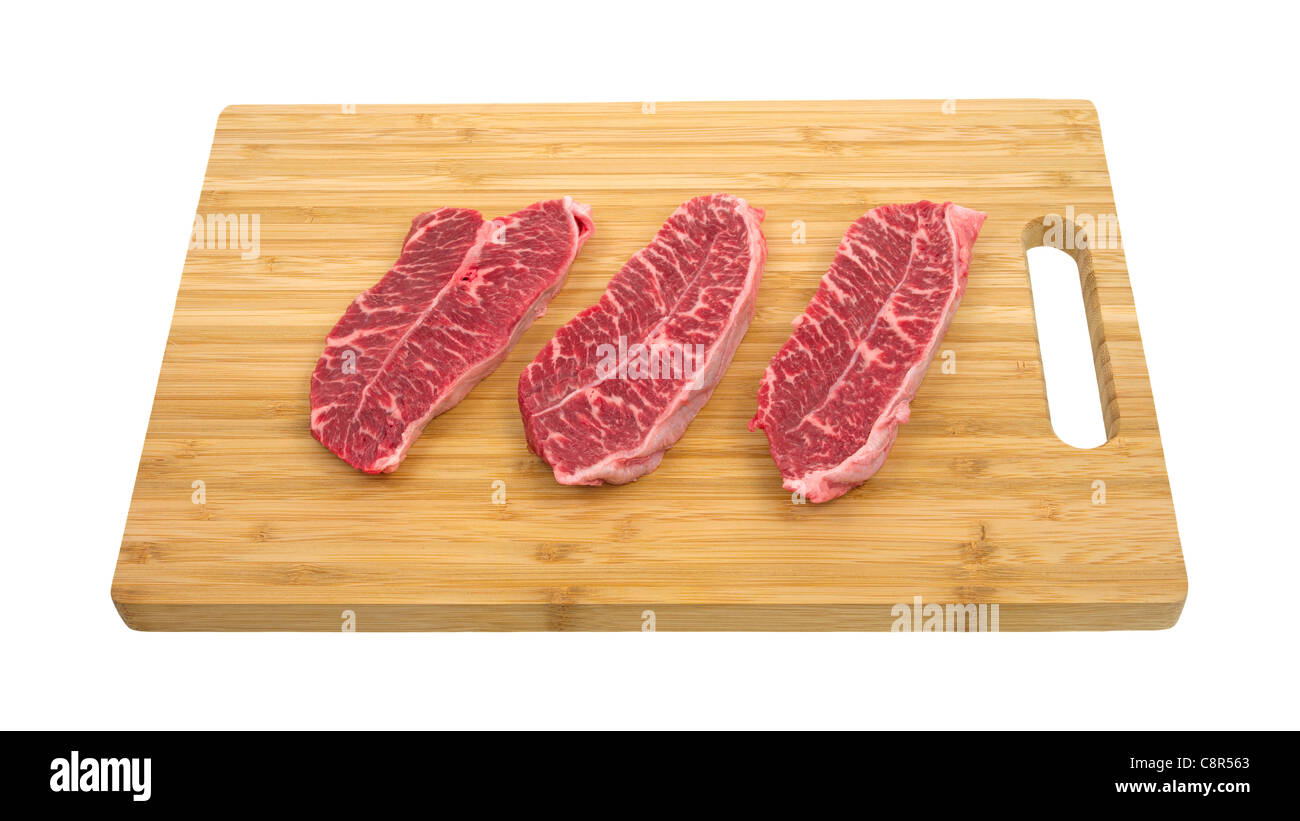 Haut désossé steak lame on cutting board Banque D'Images
