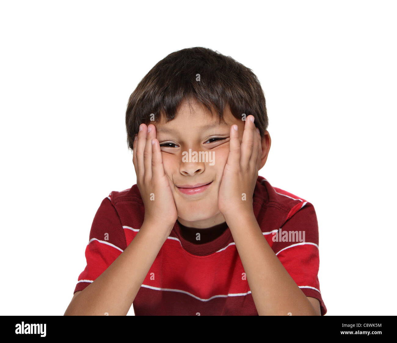 Ennuyer ou hispanique Hispanic boy with head in hands on white background Banque D'Images