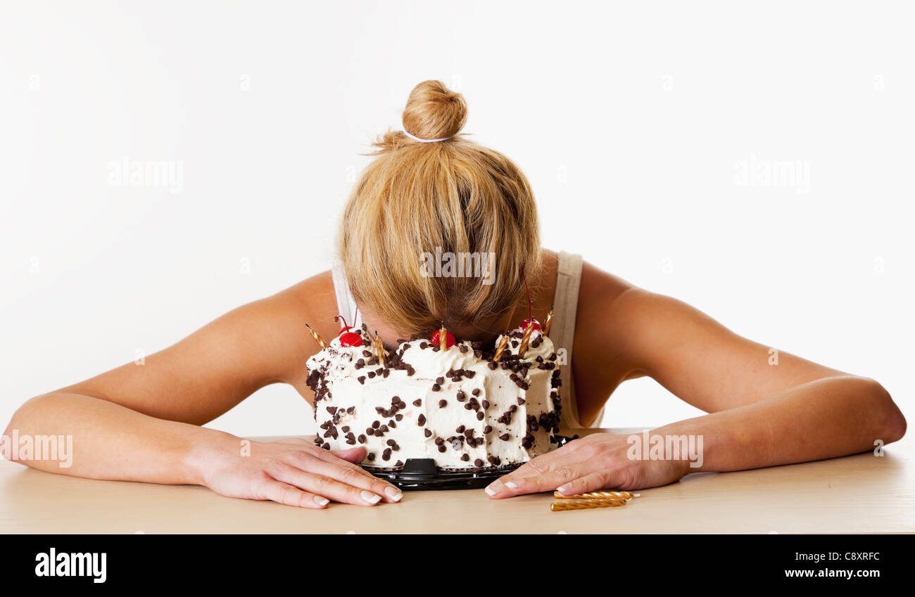 Mid Adult Woman With Head In Gateau D Anniversaire Studio Shot Photo Stock Alamy Mid Adult Woman With Head In Gateau D Anniversaire Studio Shot Photo Stock Alamy