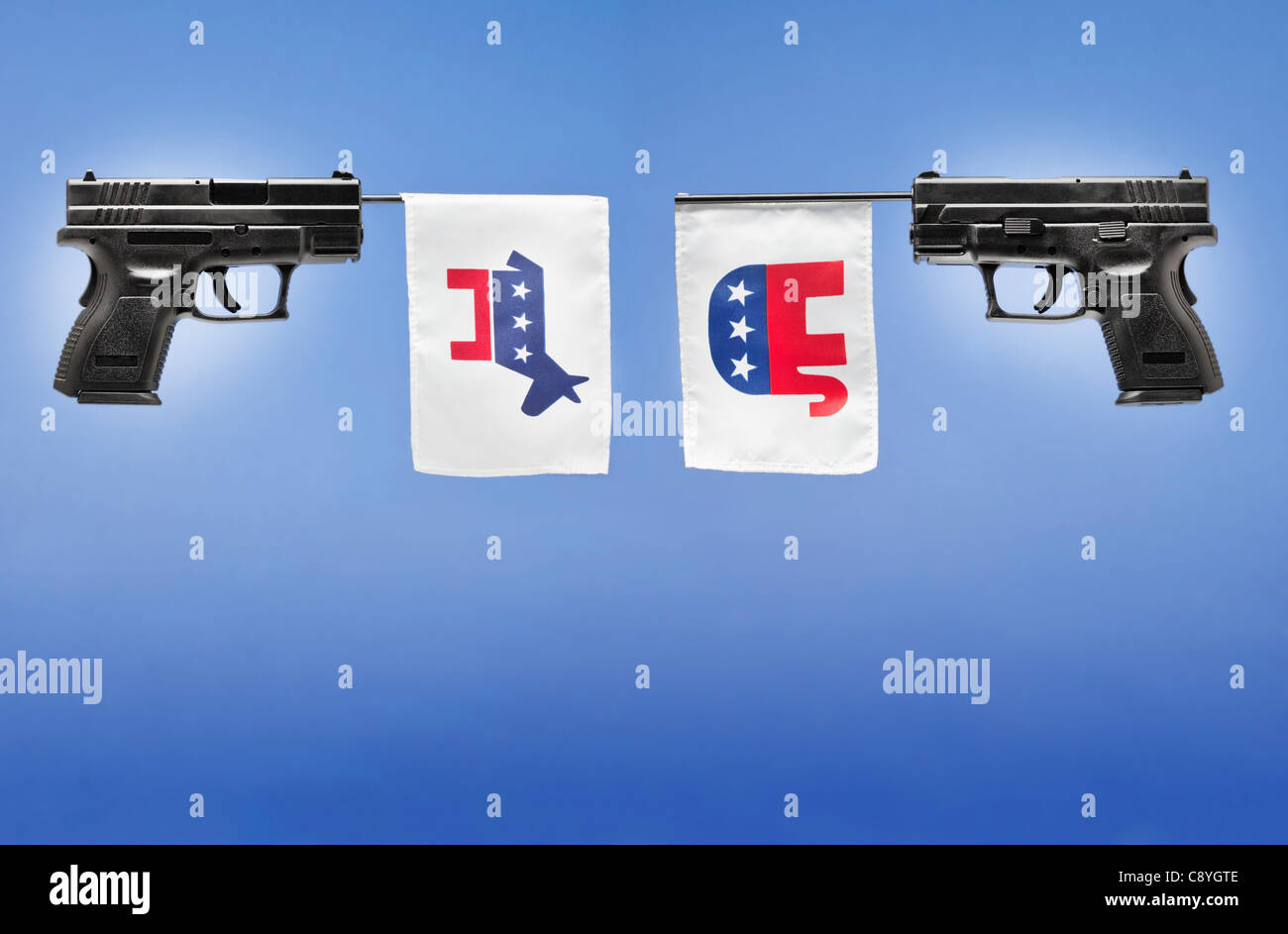 Studio shot of guns avec symboles de partis politiques Banque D'Images