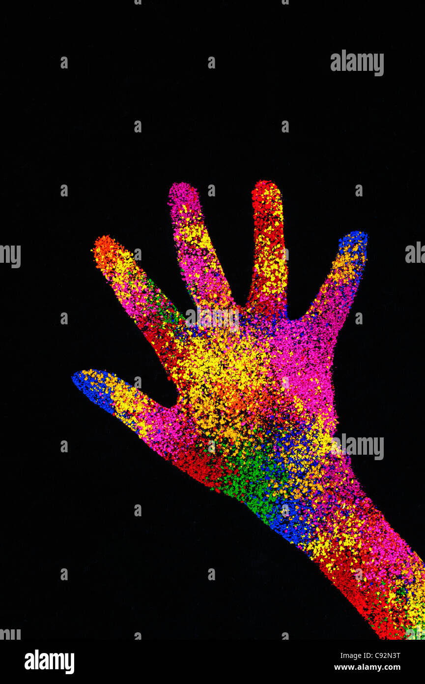 Childs hand print multicolore sur fond noir Banque D'Images