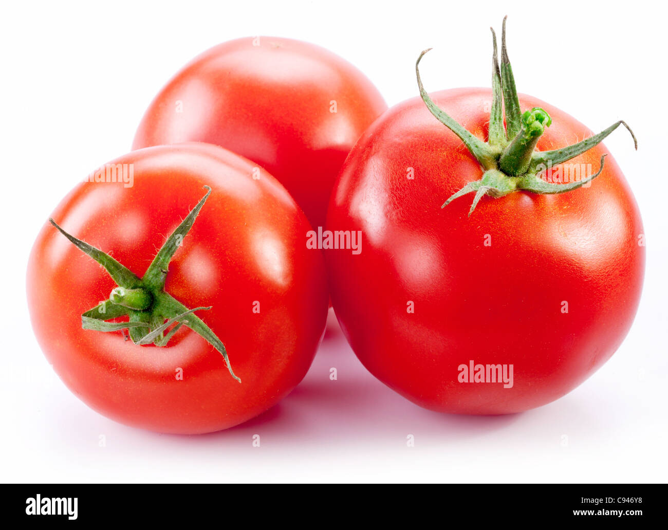 Tomates mûres isolé sur un fond blanc. Banque D'Images