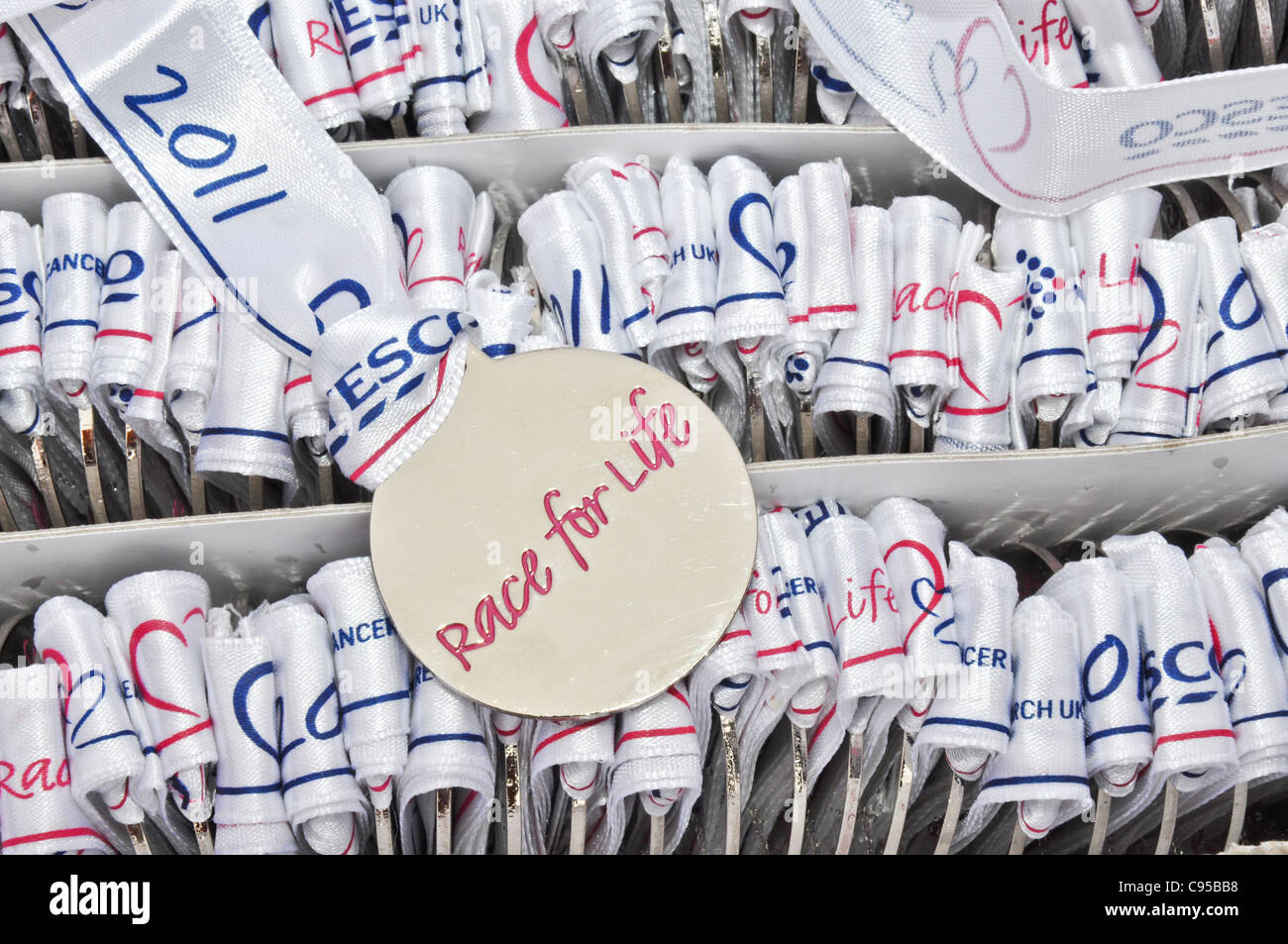 Course à la vie à courir les médailles Banque D'Images Course à la vie à courir les médailles Banque D'Images