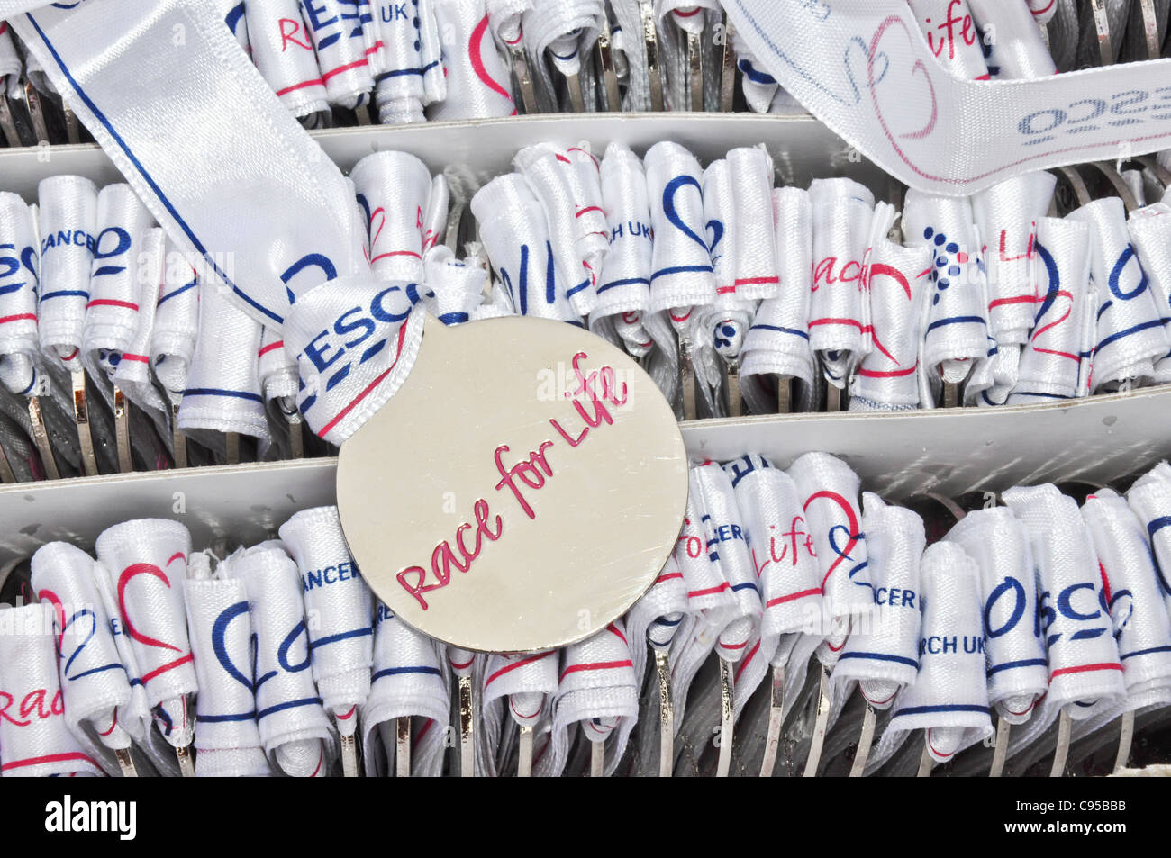 Course à la vie à courir les médailles Banque D'Images Course à la vie à courir les médailles Banque D'Images