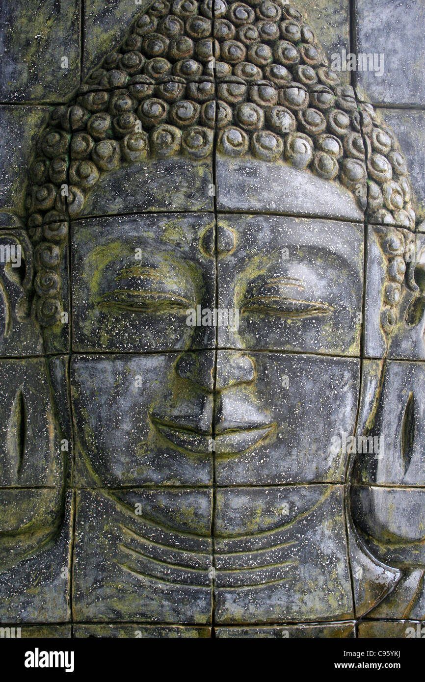 Panneau mural Bouddha sculptées en pierre Banque D'Images