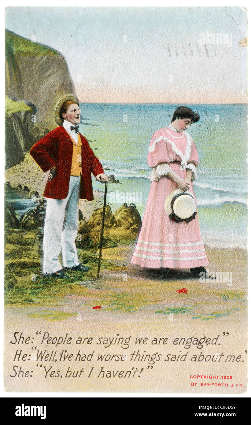 Carte postale de l'époque victorienne d'un malheureux couple at the beach Banque D'Images