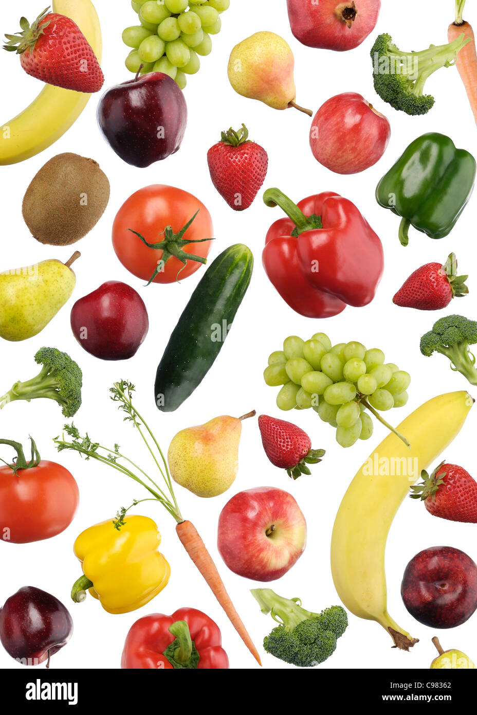 Motif coloré de fruits et de légumes relevant over white background Banque D'Images