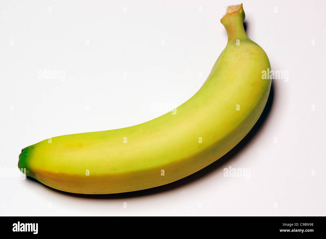 Banane sur fond blanc Banque D'Images