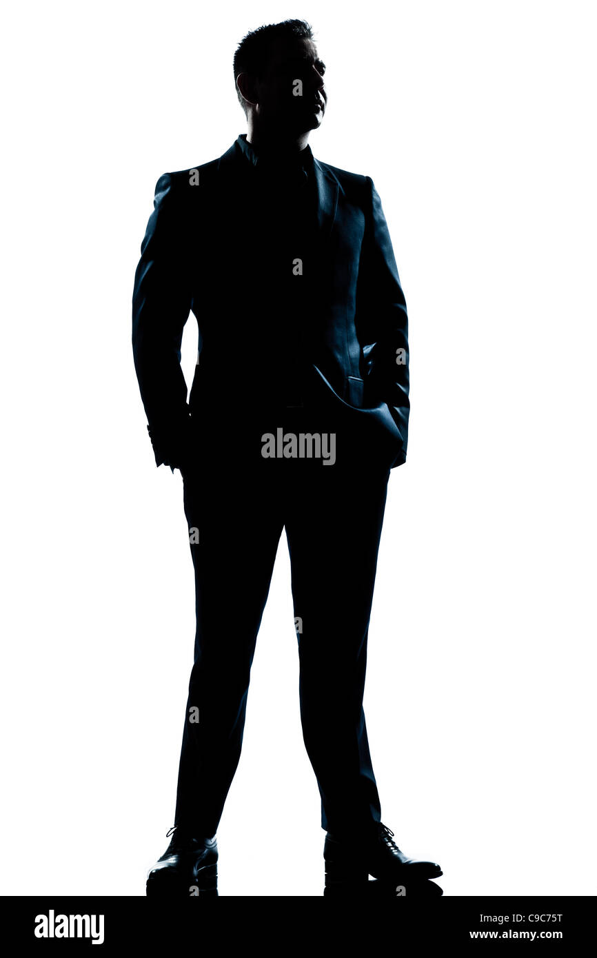 Un caucasian business man beau costume complet pleine longueur permanent silhouette grave dans studio isolé sur fond blanc Banque D'Images