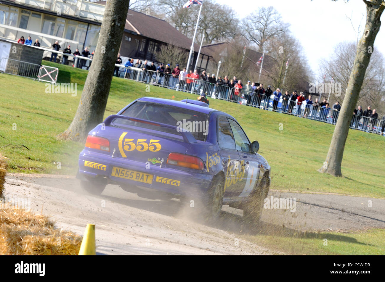 25 févr. 2012 - Stoneleigh Park, Coventry, Royaume-Uni. Ryan conduisant le Champion 1996 Lancia 555 Rally dans le vivre la scène à la Race Retro Banque D'Images