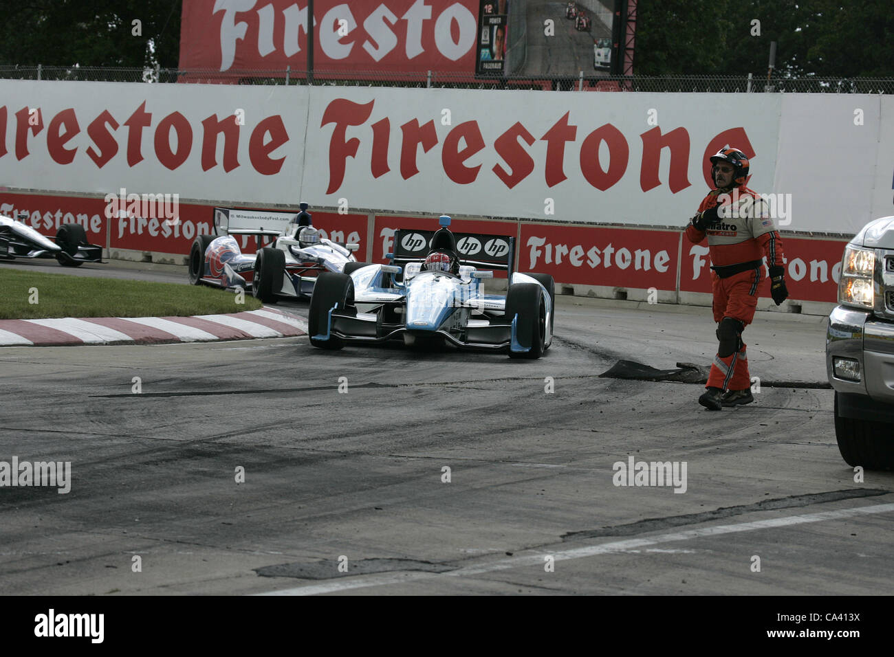 3 juin 2012 - Detroit, Michigan, États-Unis - IZOD Indycar Series, Chevrolet Detroit Grand Prix de Belle Isle, Detroit, MI, 1-3 juin 2012, Simon Pagenaud, Schmidt Hamilton Motorsports Honda HP , piste endommagée surface qui conduit à drapeau rouge période. (Crédit Image : © Ron Bijlsma/ZUMAPRESS.com) Banque D'Images