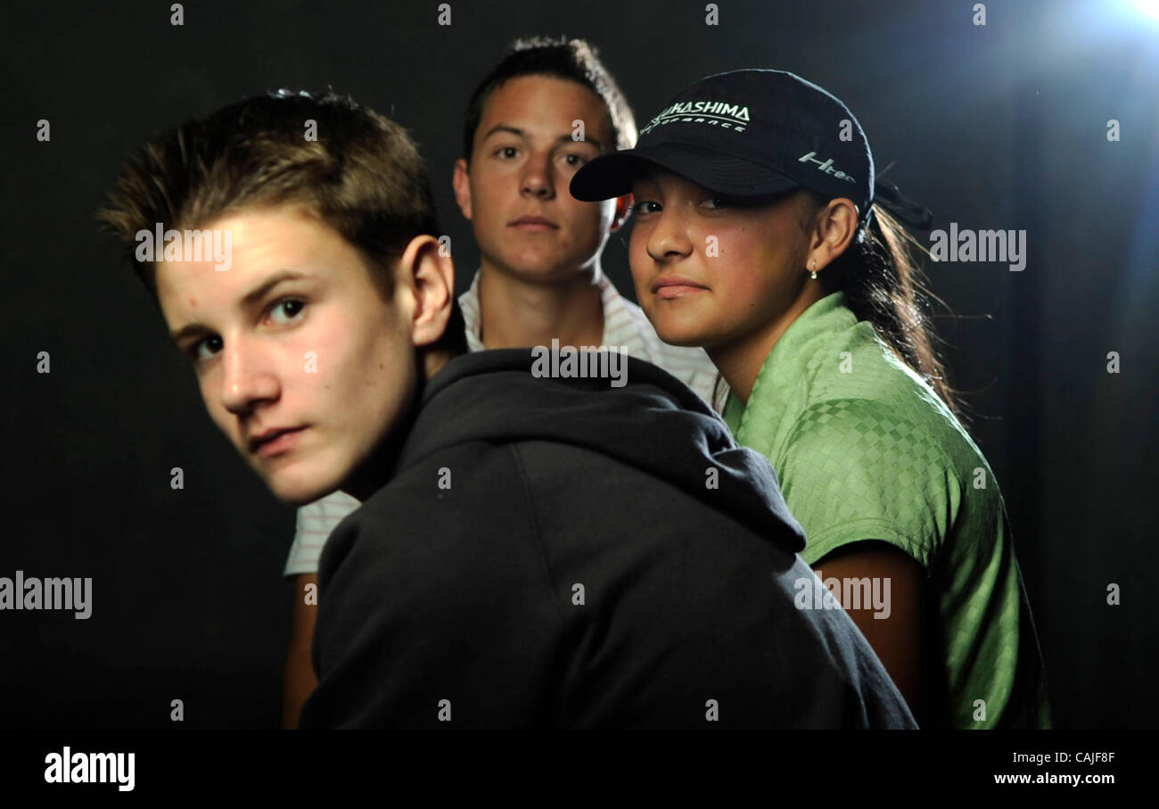 Cameron Beaubier (à gauche), une jeune fille de 14 ans qui fait concurrence à l'échelle internationale rider motocross, Mateusz Kecki (centre), un jeune joueur de tennis qui est déjà l'un des meilleurs juniors dans la région, et Ashley Noda (droite) un jeune golfeur qui peut être dirigé à toute une carrière. Le trio a été photographié Jeudi, Dece Banque D'Images