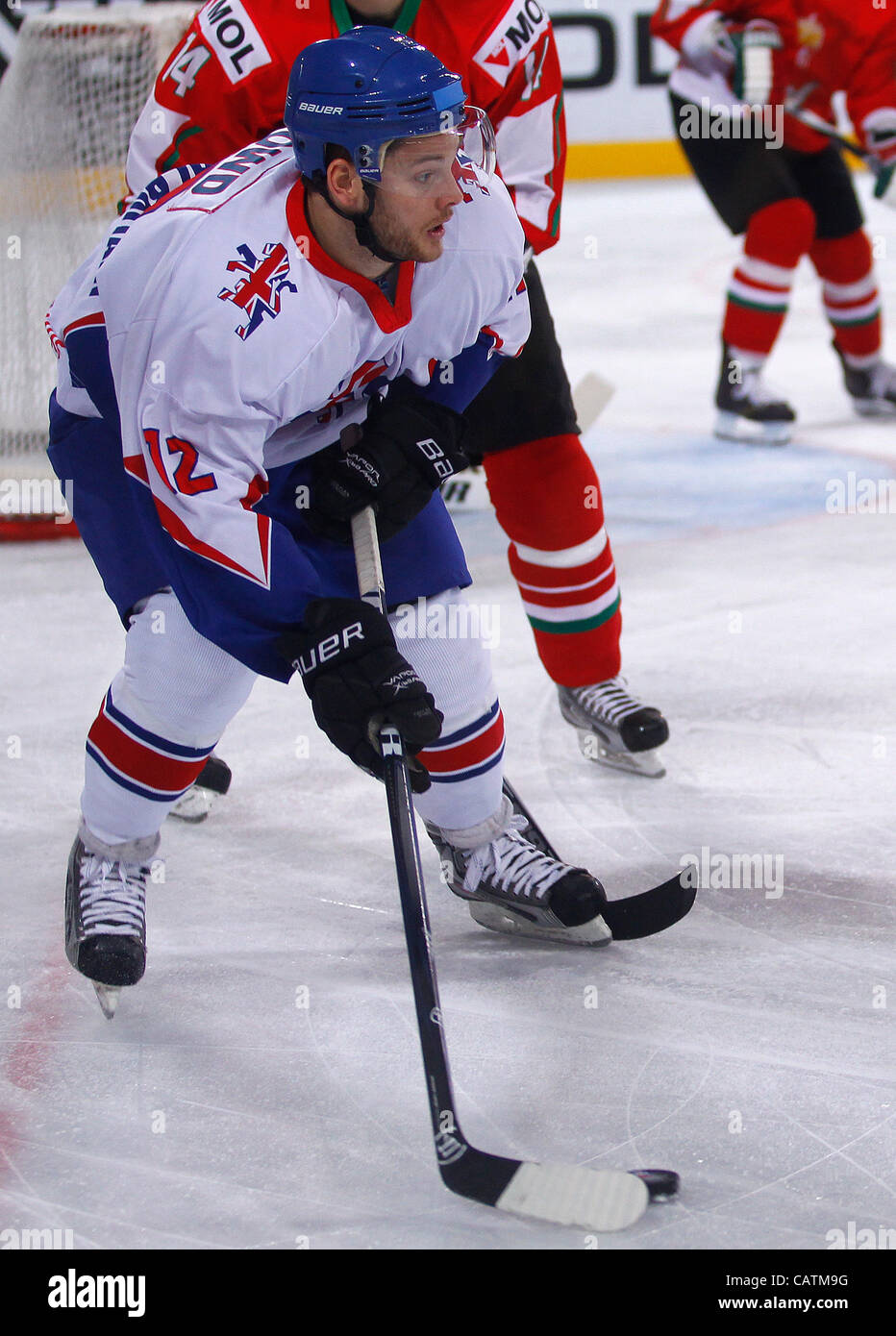 21.04.2012. Ljubljana, Slovénie. Robert Dowd (no12) de Grande-Bretagne au cours de match de championnat du monde de hockey 2009 Division 1 groupe A entre la Grande-Bretagne et la Hongrie. Tenue à Stozice Arena à Ljubljana, Slovénie . La Grande-Bretagne a gagné et qualifié pour la finale de l'année prochaine. Banque D'Images 21.04.2012. Ljubljana, Slovénie. Robert Dowd (no12) de Grande-Bretagne au cours de match de championnat du monde de hockey 2009 Division 1 groupe A entre la Grande-Bretagne et la Hongrie. Tenue à Stozice Arena à Ljubljana, Slovénie . La Grande-Bretagne a gagné et qualifié pour la finale de l'année prochaine. Banque D'Images