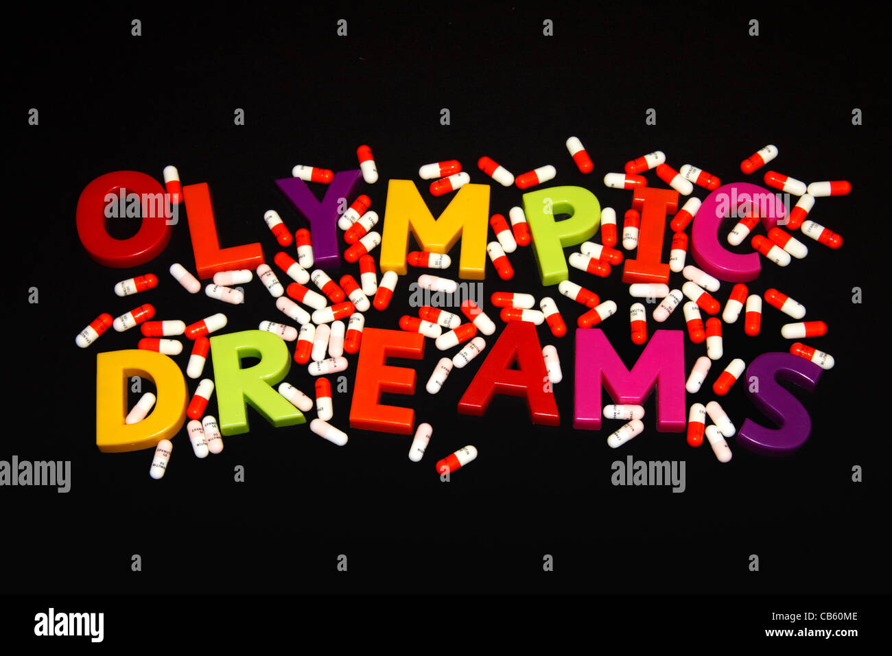 'Rêves Olympiques' épeautre avec des lettres magnétiques entouré par des gélules Banque D'Images