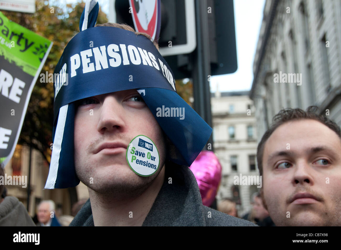 Un enseignant a un autocollant sur son visage en disant 'NUT sauver nos retraites". Une journée de grève contre les coupes dans les retraites par les travailleurs du secteur public Banque D'Images