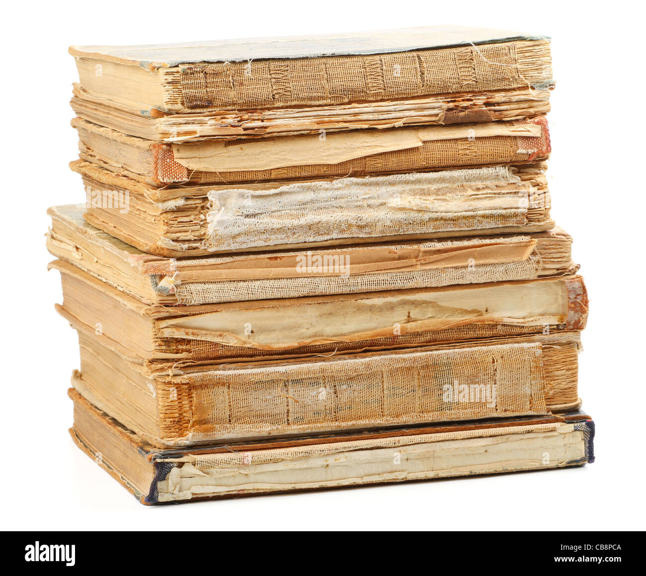 Livres anciens de différentes formes et couleurs. Isolé sur fond blanc. Banque D'Images