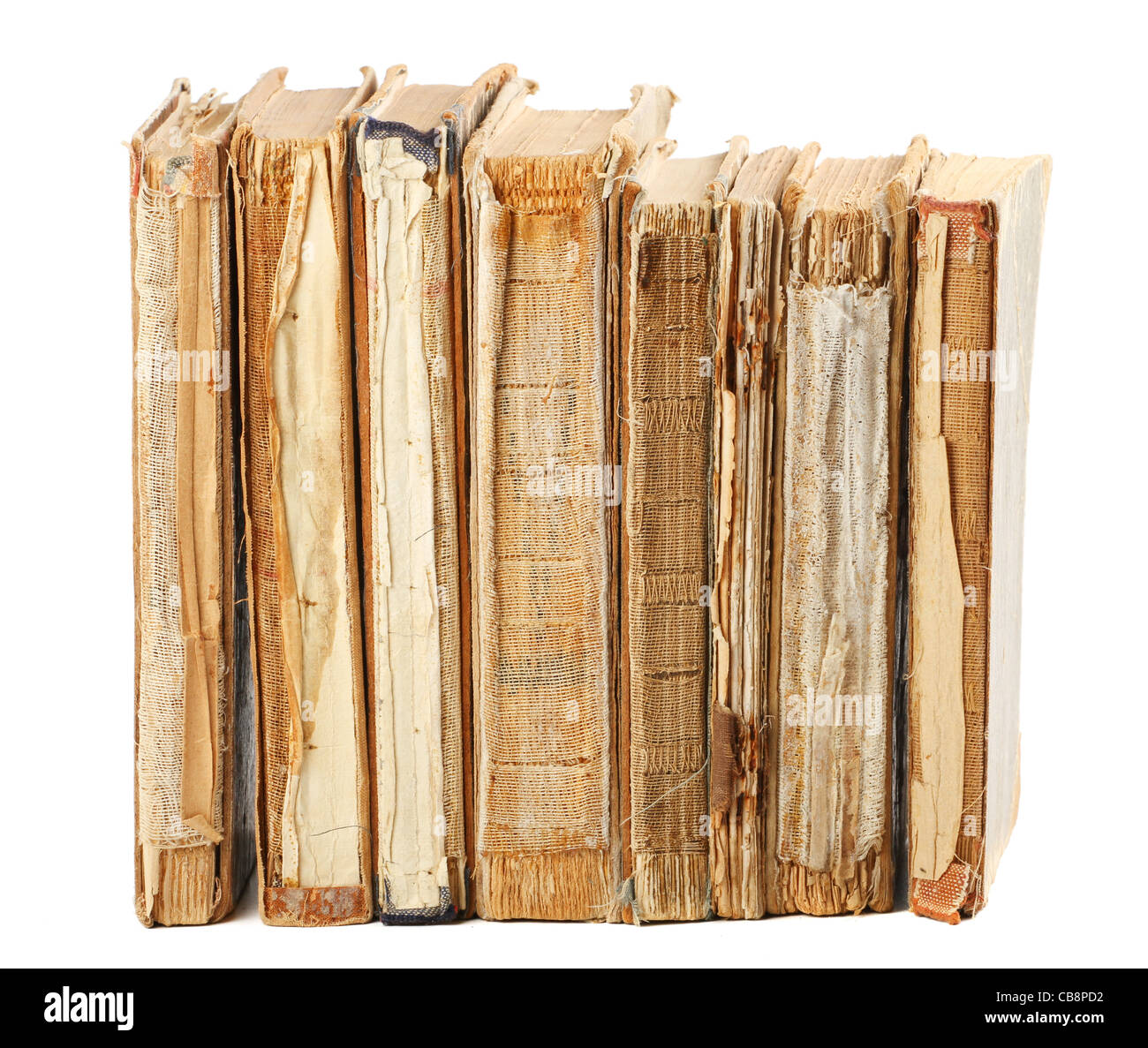 Livres anciens de différentes formes et couleurs. Isolé sur fond blanc. Banque D'Images