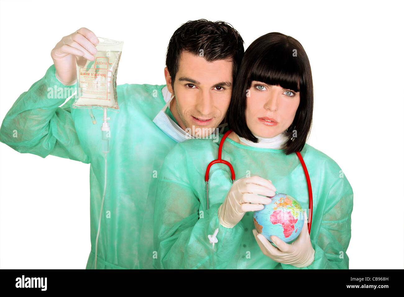 Deux médecins guérir un peu de monde Banque D'Images