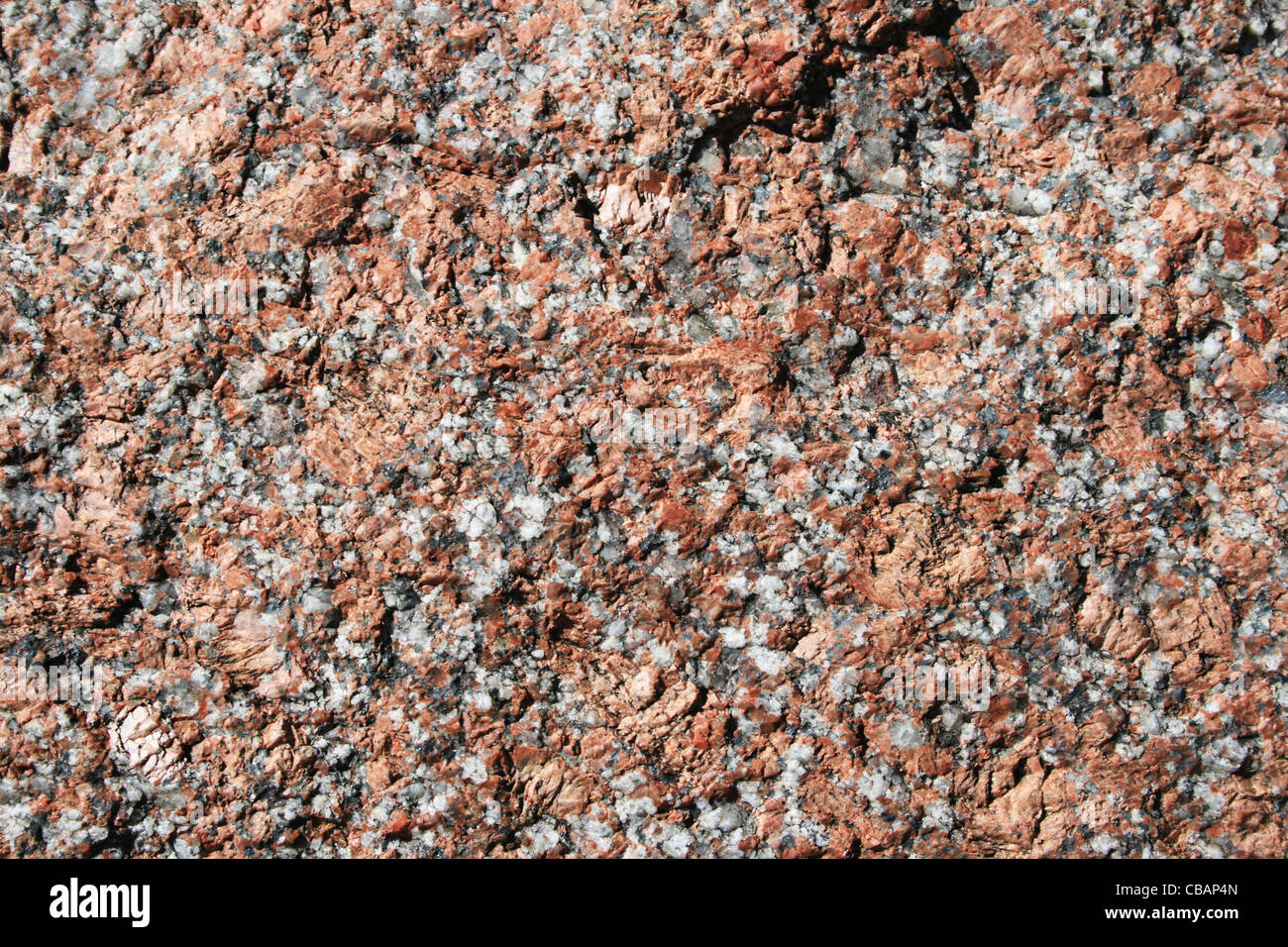 Les feldspath rose et gris granite rock surface Banque D'Images